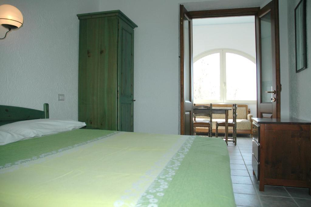 Acacia Appartamenti Cala Gonone Oda fotoğraf